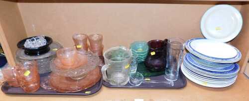 Glassware and plates, to include pink glass plates, tea cups and saucers embossed with a floral...
