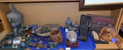 Asian collectibles, to include a Japanese theatre mask, a stone carved pomero, a bronzed statue...