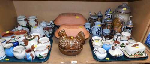 Devon motto wares, including jugs, bowls, butter dish, etc., together with Rumtophf stoneware...