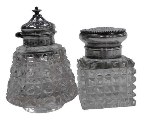 A Victorian cut glass and silver mounted inkwell, with a hinged lid, London 1885, and a cut...