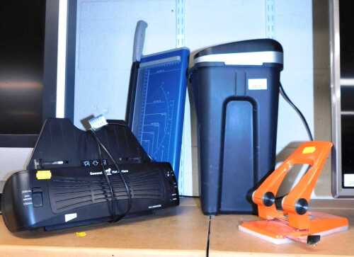 A Rexel Whisper document shredder, together with a guillotine, Rymans laminator, and a hole...