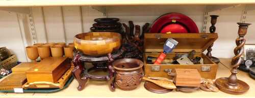 A group of treen, to include Asian vase stands, 21cm high, decorative wooden boxes with cherub...