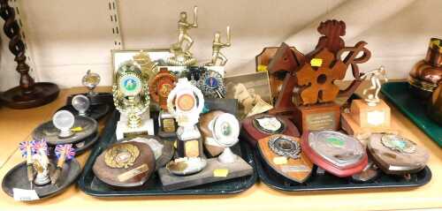 Football and cricket trophies, including shields, figural, and pin bowl varieties. (2 trays and...