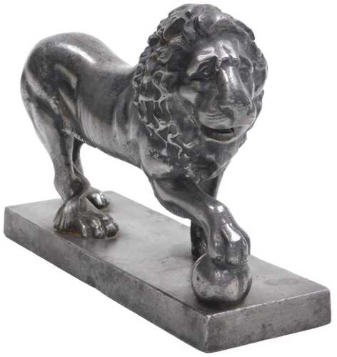 A late 19thC cast iron Medici Lion door porter, raised on a rectangular base, 16cm high, 23.5cm...