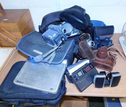 Cameras and related equipment, to include a Sony digital Handicam, model DCR-TRV14E, cased with...