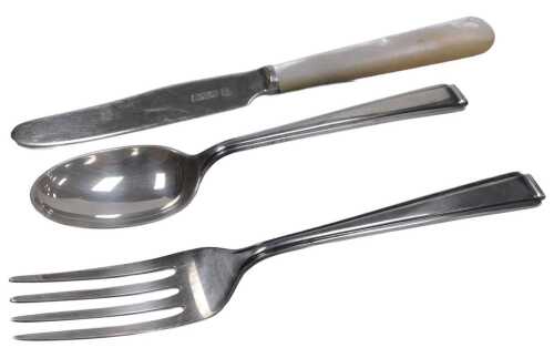 An Elizabeth II silver child's three piece cutlery harlequin set, comprising spoon, fork, and...