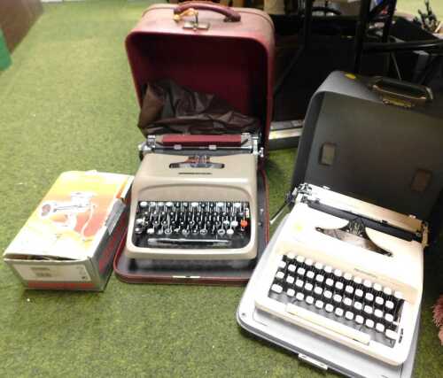 A Remington Ten Forty typewriter, cased, together with an Olivetti Studio 44 typewriter, cased,...
