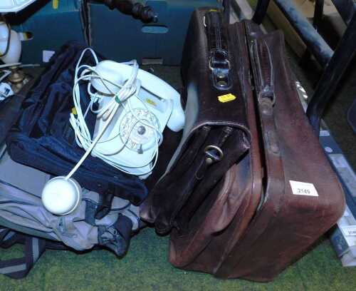 Bags, to include a mid 20thC gentleman's leather suitcase stamped J.S, a leather briefcase, a...