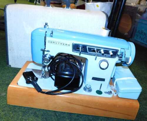 A Brother electric sewing machine, serial number A394323, cased.