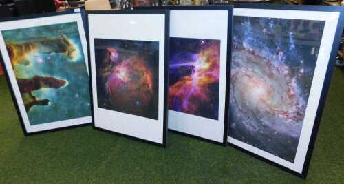 A series of astro photographs, with examples of a nebula and a whirlpool galaxy, 72cm high, 50cm...