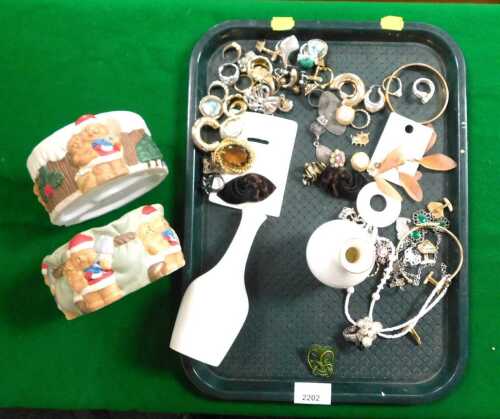 Jewellery and ceramics, including two Christmas themed wine holders, featuring Santa Claus and...