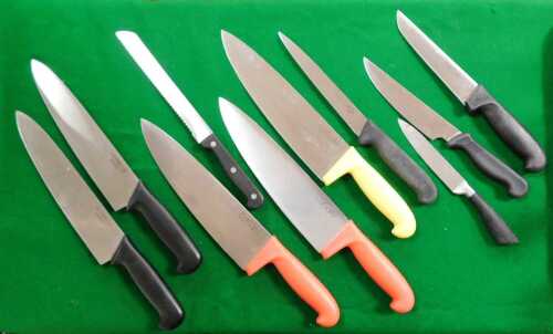 A set of commercial kitchen knives, to include Col Safe carving knives, a Rostfrei bread knife,...