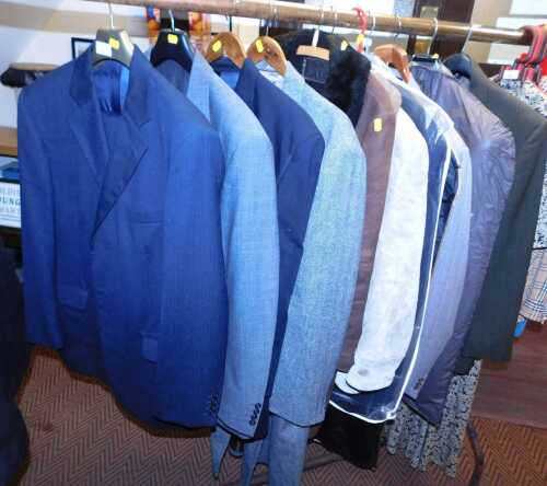 Gentleman's sheepskin jackets, one light tan and one brown three quarter length example,...