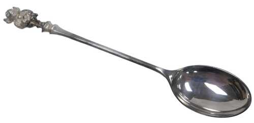 An Elizabeth II silver coffee spoon, with a Lincolnshire Imp terminal, for Usher of Lincoln,...