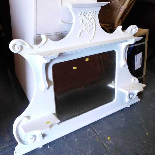 A late Victorian painted overmantel mirror, with shelves.