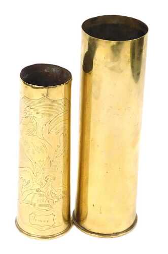 A WWI brass trench art shell case, engraved with the French cockerel, perched on the Prussion...