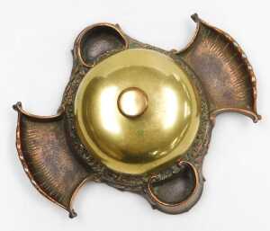 A late 19thC cast copper and brass hotel desk bell and match strike, stamped to underside Russel... - 2