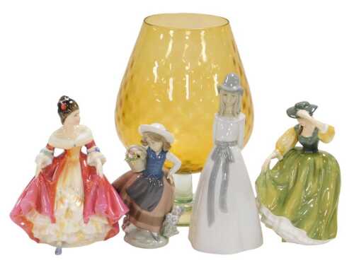 Two Royal Doulton figures, modelled a Buttercup HN2309, and Southern Belle HN2229, together with...