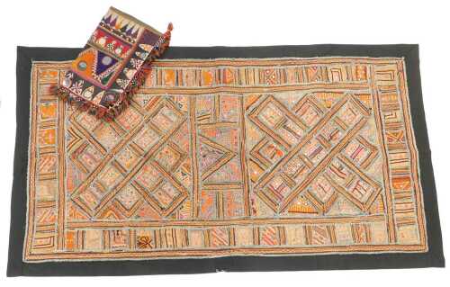 A Kutch-Bhuj wall hanging, with pukka mirrorwork and geometric panel decoration, together with a...