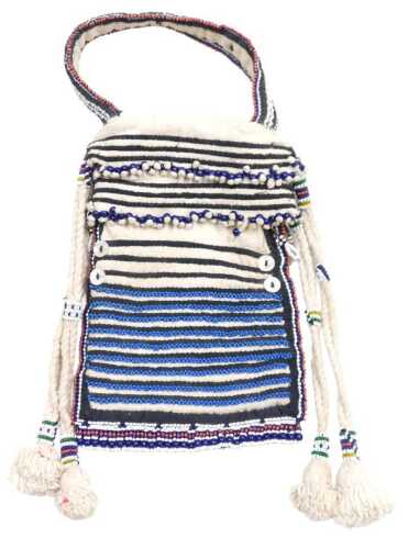 A Xhosa lady's tobacco bag, in cream and black striped hand embroidered fabric, with mother of...