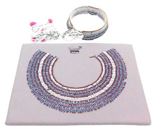 A Xhosa Thembu beadwork neck cascade, as worn by a young man, with white drop strands...