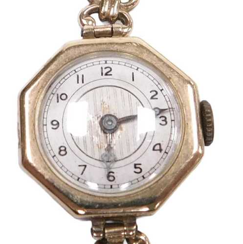A 9ct gold cased lady's wristwatch, circular silvered dial bearing Arabic numerals, Swiss...