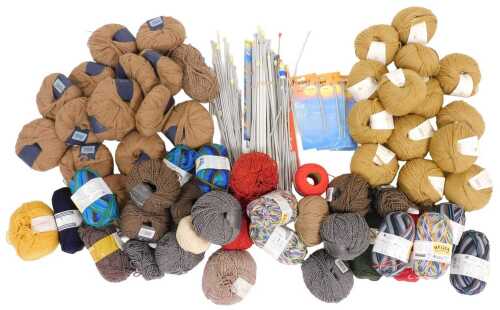 Assorted alpaca and wool yarns, together with knitting needles. (a quantity)