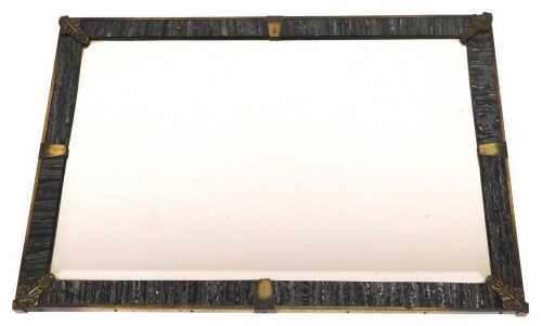 A metal and faux black marble framed rectangular wall mirror, inset bevelled glass, 59.5cm x...