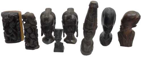 A group of African tribal busts and carvings, together with a plaster bust of Nefertiti. (8)