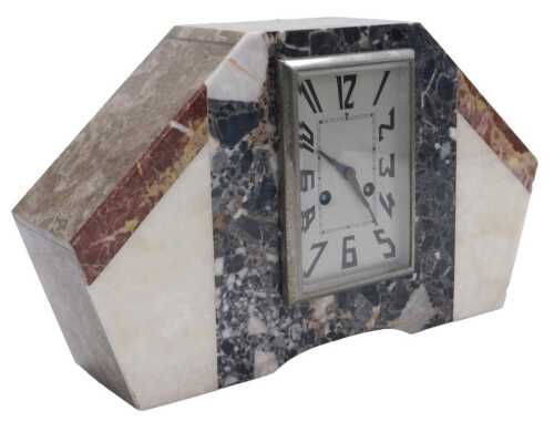 A French Art Deco marble cased mantel clock, with a rectangular silvered dial bearing Arabic...