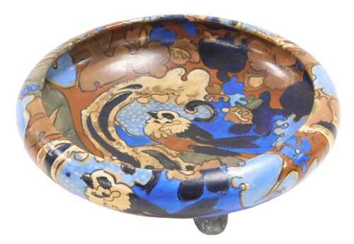 An early 20thC Bursleyware Amstel pattern fruit bowl, decorated with a bird in a stylised wood,...