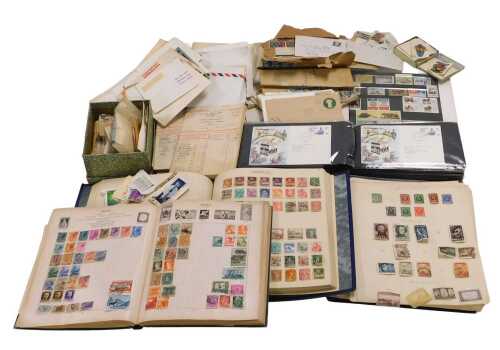 Philately. Postage stamps, two albums of GB and world stamps, stockbook, loose stamps, first day...