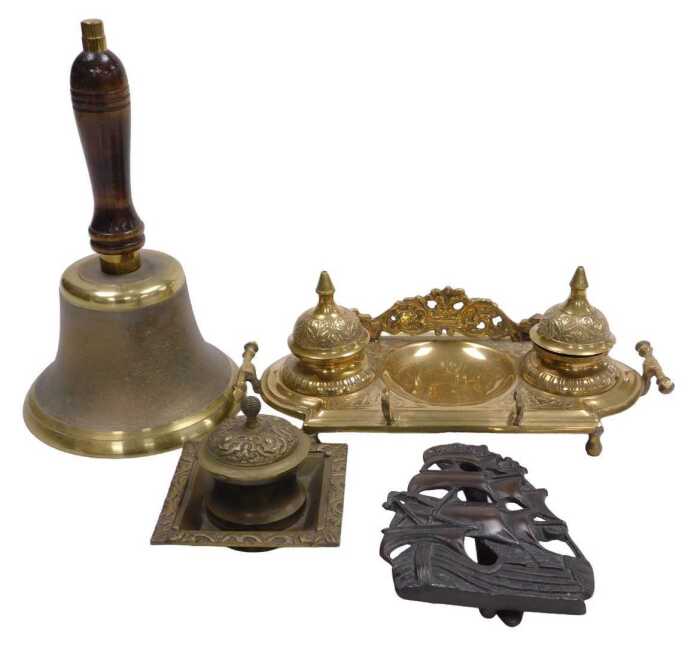 A Continental brass ink stand, with two hinged wells and pen receptacle, 28cm wide, a brass...