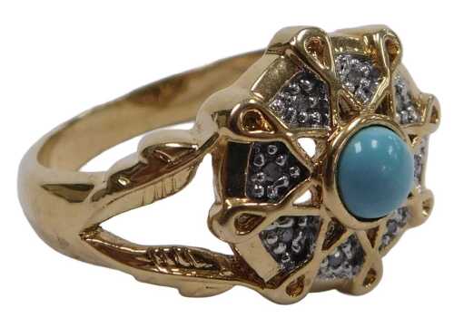 A turquoise and diamond cluster ring, the turquoise cabochon in a surround of tiny diamonds, in...