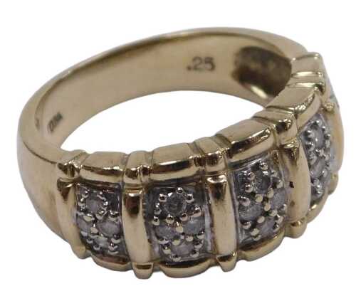 A 14ct gold and diamond dress ring, with five reserves of pave set brilliant cut diamonds, size...