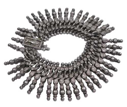 An Indian fringe bracelet, on an embossed fish snap clasp, white metal, stamped 925, 5.25oz.