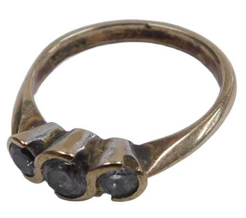 A 9ct gold and cz three stone ring, size P&frac12;, 3.1g.