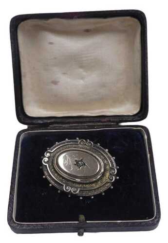 A Victorian diamond set brooch, with an old cut diamond in a floral setting, in yellow metal,...