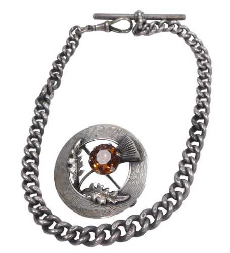 A silver graduated curb link Albert chain, with lobster claw clasp, and T bar as fitted,...