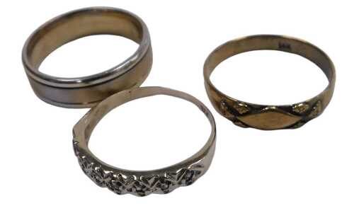 A seven stone diamond set ring, in yellow metal, stamped 9ct, size S, 1.9g, and two bands, one...