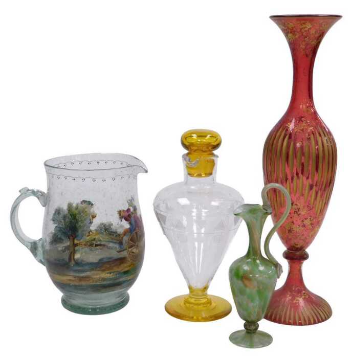 A late 19thC Bohemian style ruby tinted baluster shaped vase, with gilt incised decoration, 39cm...