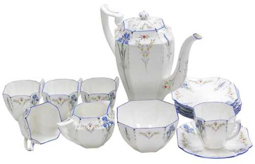An early 20thC Shelley porcelain Blue Iris pattern part coffee service, Queen Anne shape,...