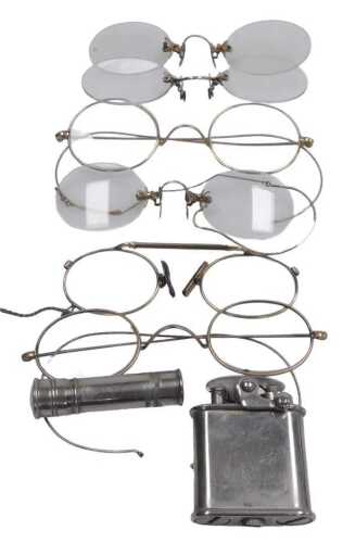 Six pairs of early 20thC spectacles, with gold plated frames or bridges, together with a Colibri...
