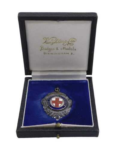 A Football League silver and enamel medal, engraved verso Associate Members' Cup 1983/84...