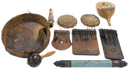 Three African thumb pianos, a hide bound drum, a bamboo rain stick, a gourd banjo, etc. (a...
