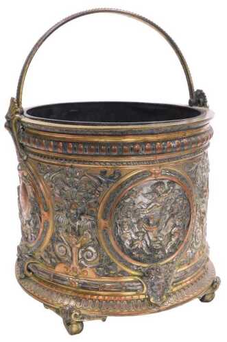 A late 19thC Continental copper brass and plated coal bucket, with elaborate Renaissance-style...
