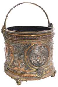 A late 19thC Continental copper brass and plated coal bucket, with elaborate Renaissance-style...