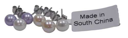 Three pairs of silver and cultured pearl ear studs.
