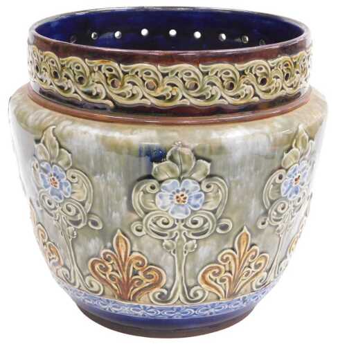 A 19thC Doulton Lambeth jardiniere, decorated with flowers, scrolls, etc., on a mottled green,...