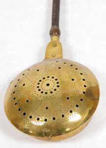 A 19thC pierced brass warming pan, with a turned wooden handle, 111cm long, and a smaller... - 2